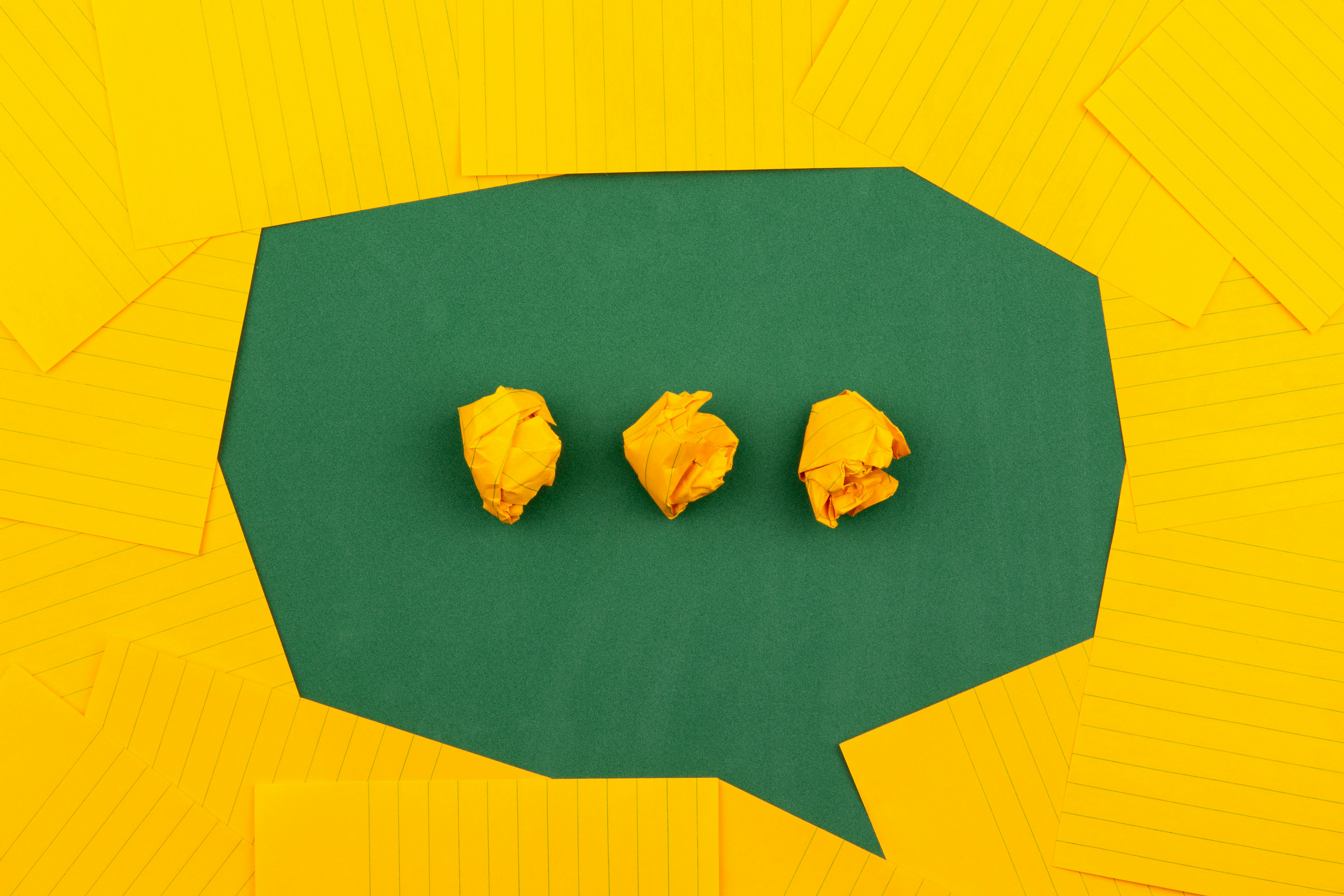 Speech bubble made out of notepad papers